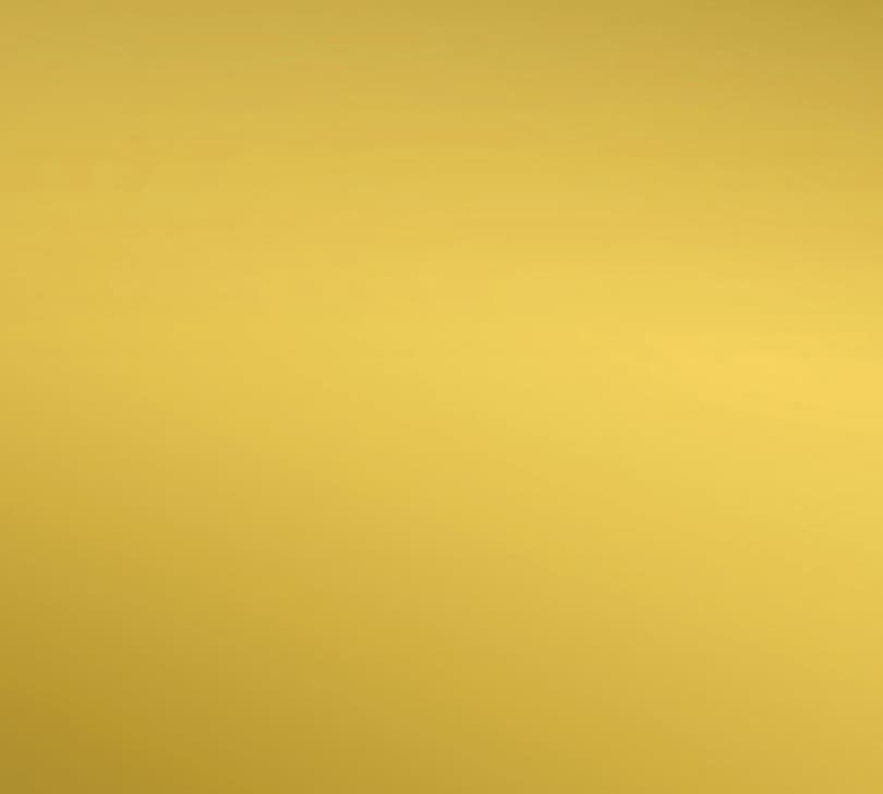 Smooth golden yellow surface with a subtle gradient and a soft, elegant metallic sheen.